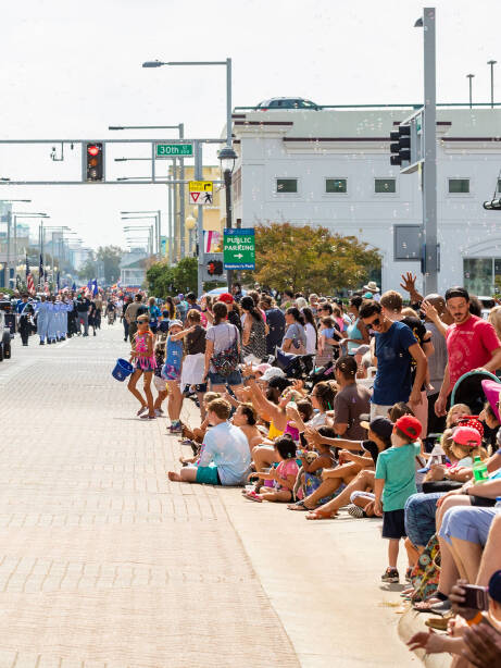 Community crowds Lining Parade Route