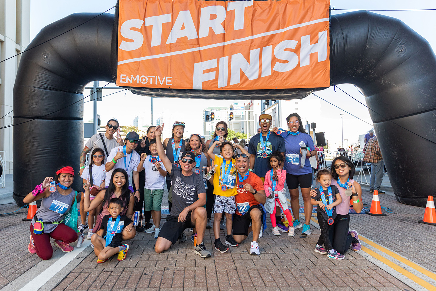 Group gathered at finish line after Neptune 8K Race