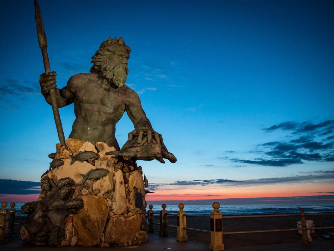 Neptune Statue at sunrise in Virginia Beach