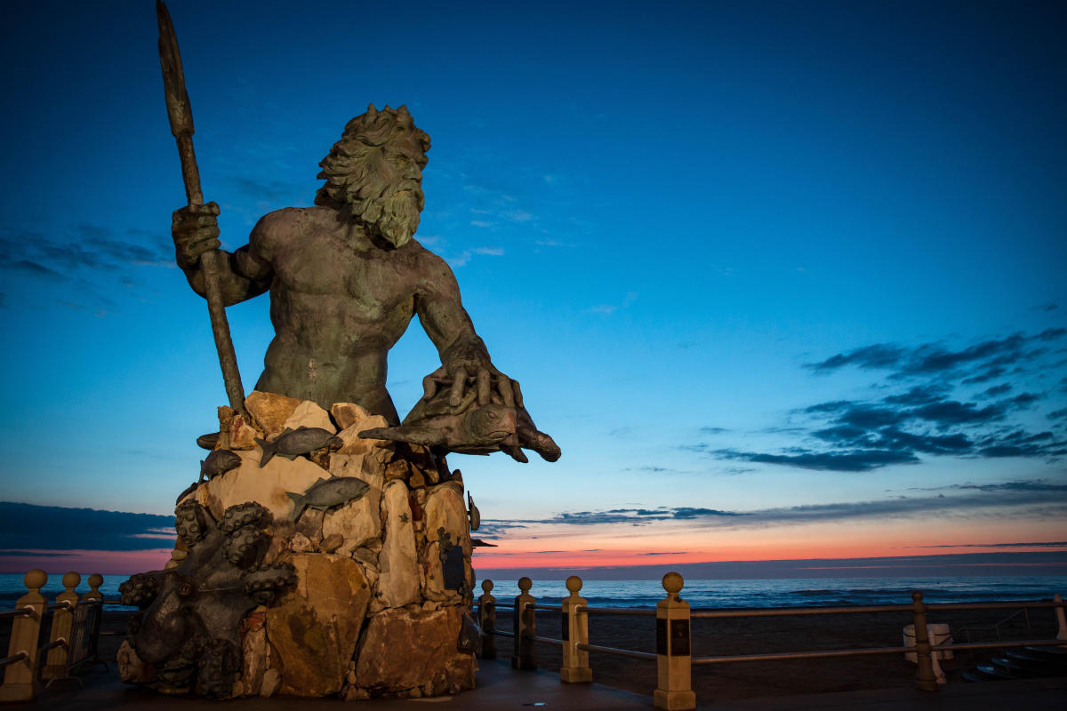 Neptune Statue at sunrise in Virginia Beach