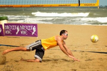 Player hitting ball at Neptune's Volleyball Tournament