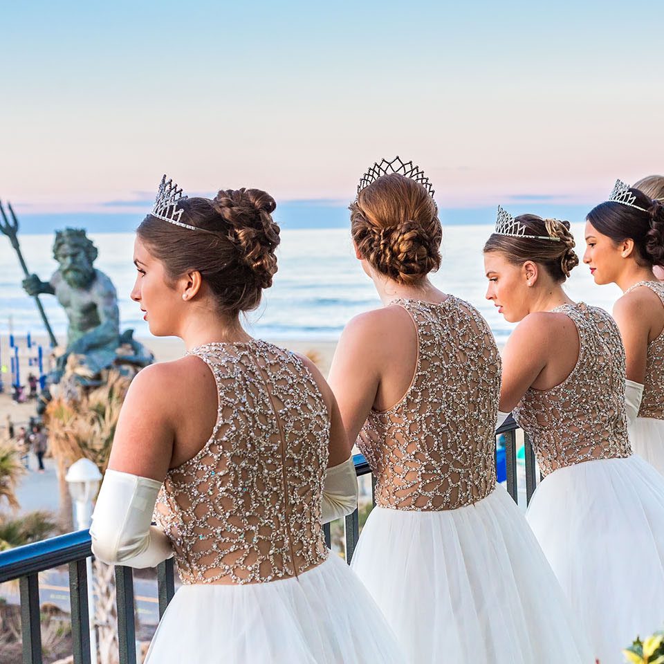 Neptune Festival Royal Court Princesses overlooking Neptune Statue on Boardwalk