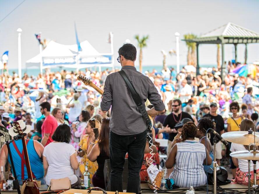 Band performing looking into crowd at Neptune's 25th Annual Fall Wine Festival