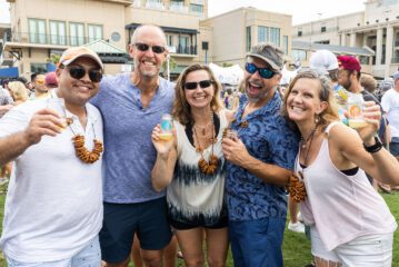 Group posing for photo at Coastal Craft Beer Festival