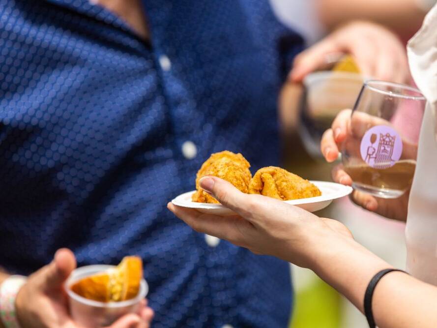 People eating at Neptune's 25th Annual Fall Wine Festival