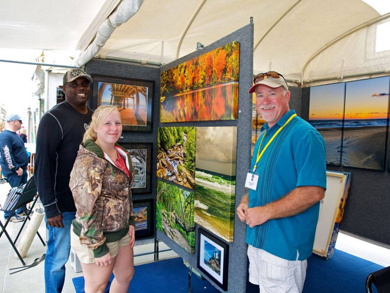 Artist and attendees at Neptune's Art & Craft Show