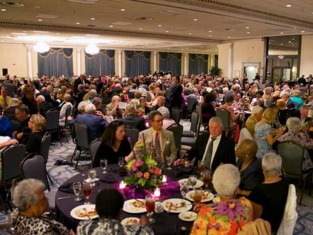 People gathered in ballroom during Seniors Gala