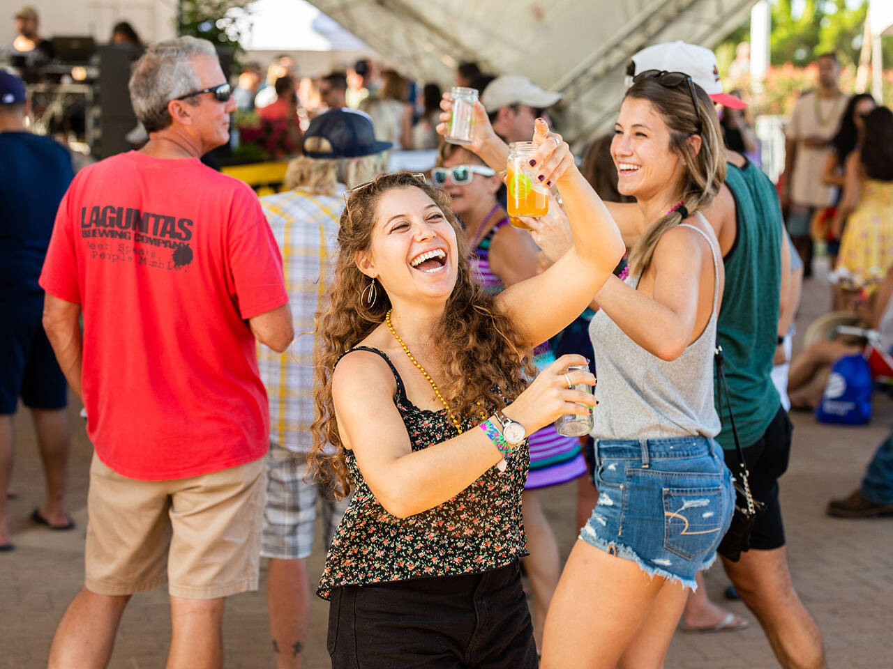 Young women dancing at Coastal Craft Beer Festival