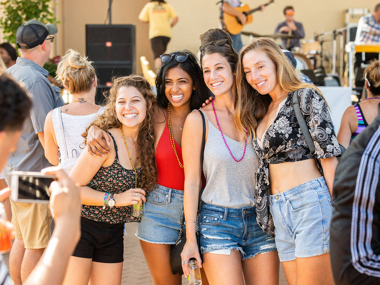 Group posing for photo at Coastal Craft Beer Festival