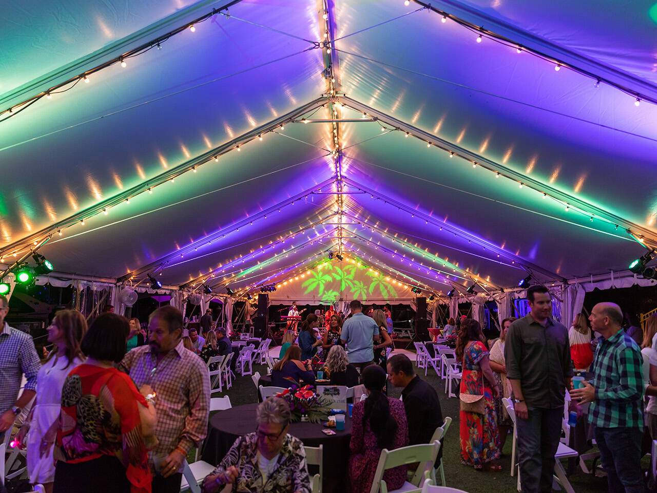 Group gathered in tent for End of Summer Bay Bash