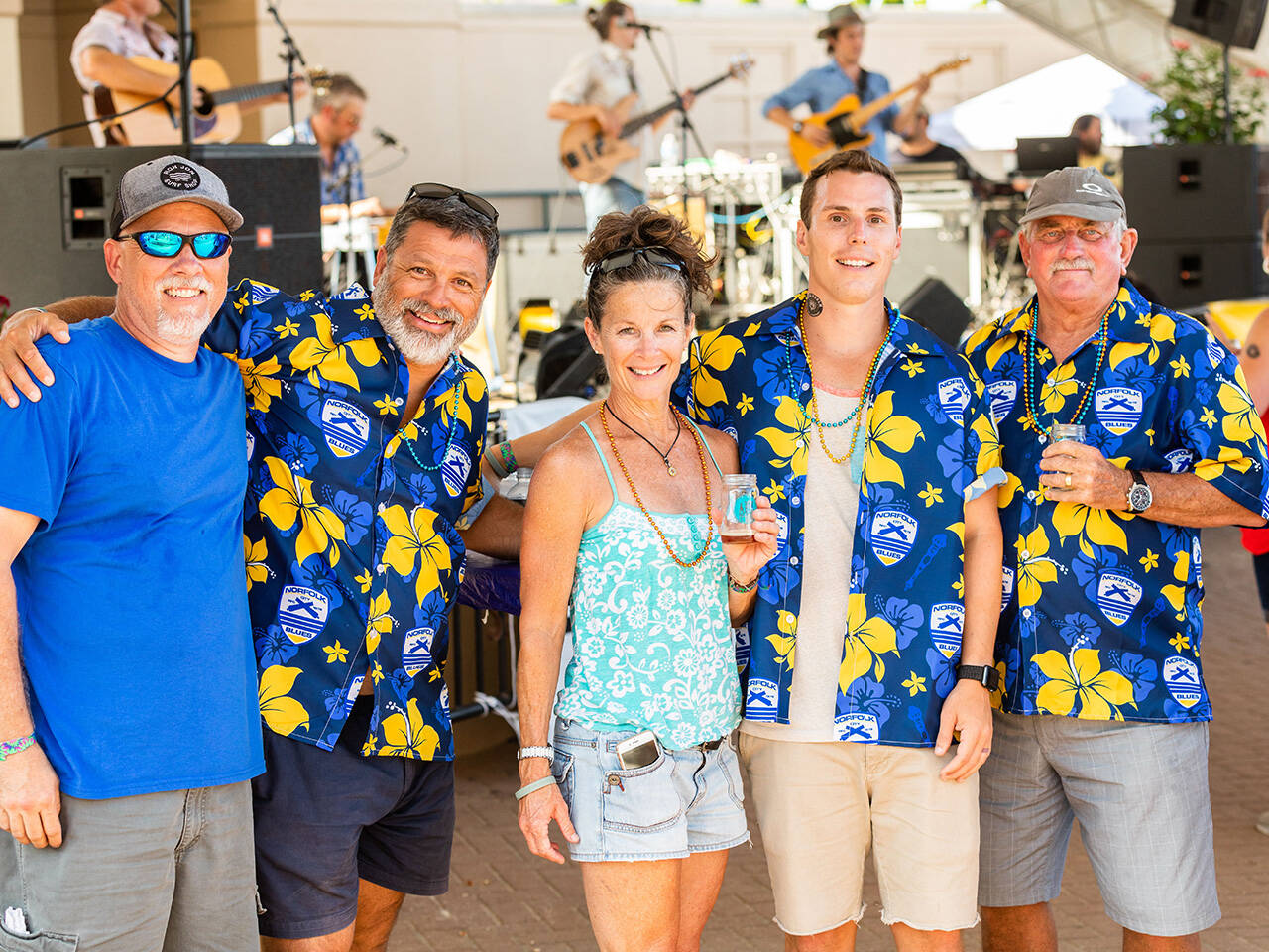 Group posing for photo at Coastal Craft Beer Festival