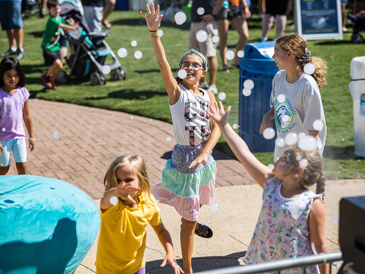 Children playing with bubbles at Poseidon's Playground