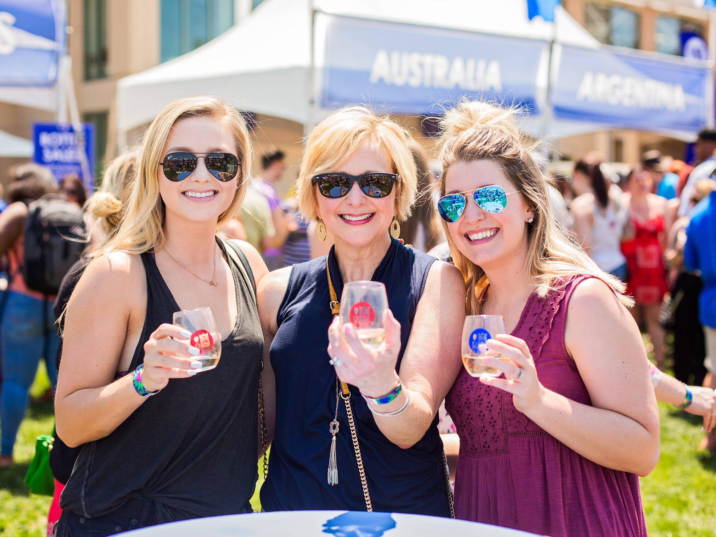 Ladies gathered for photo at Neptune Festival Spring Wine Festival