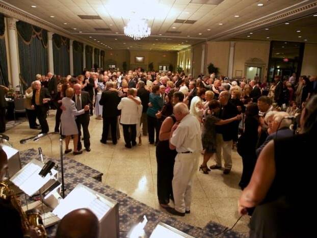 People gathered in ballroom during Seniors Gala