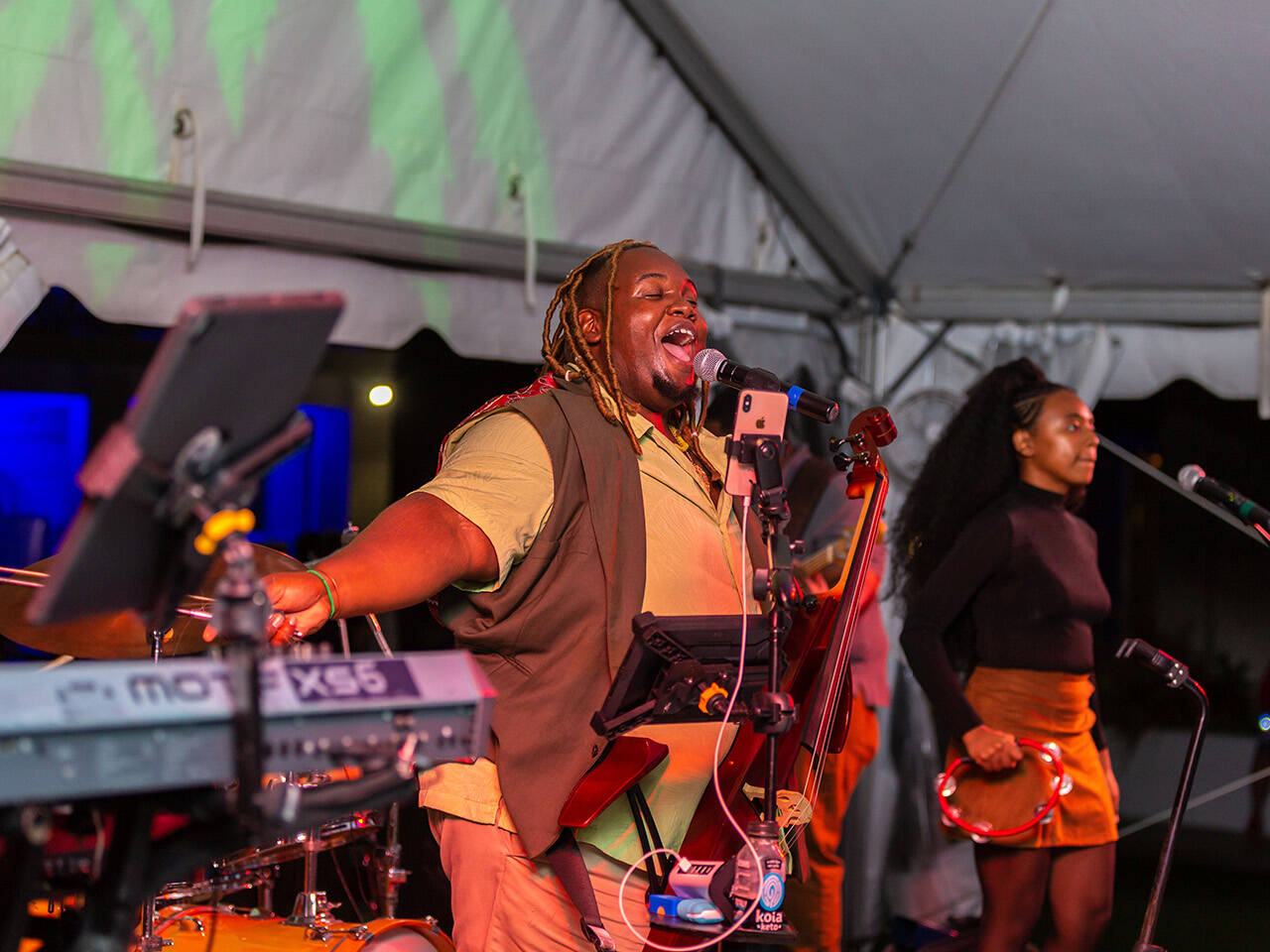 Performer singing at End of Summer Bay Bash