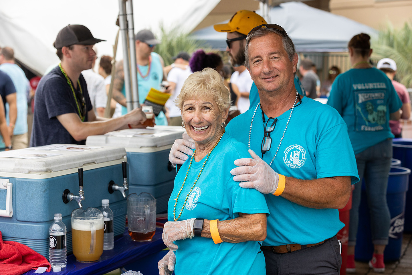 Two volunteers posing for photo at Craft Beer Festival