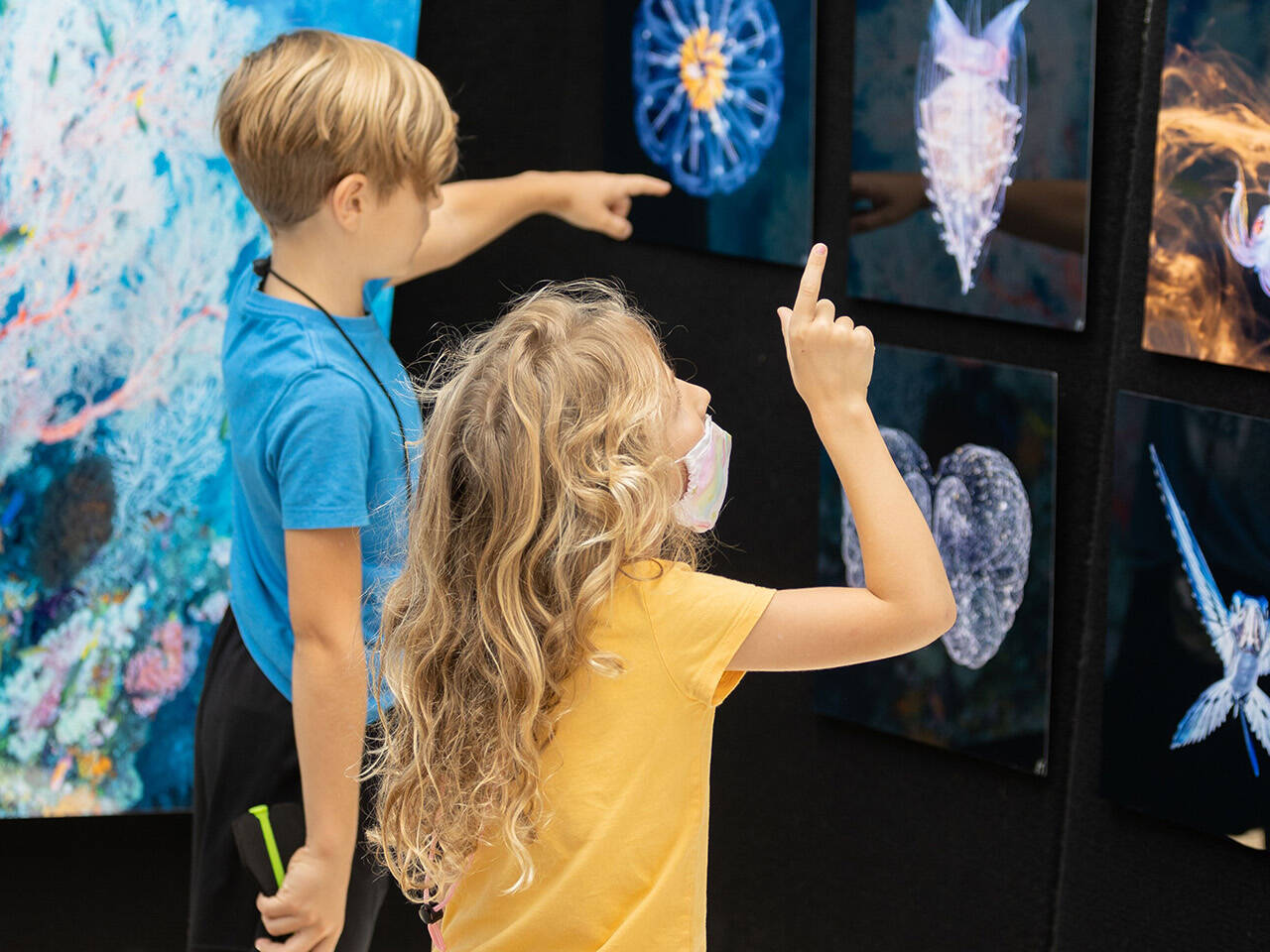 Children viewing art at Neptune's Art & Craft Show