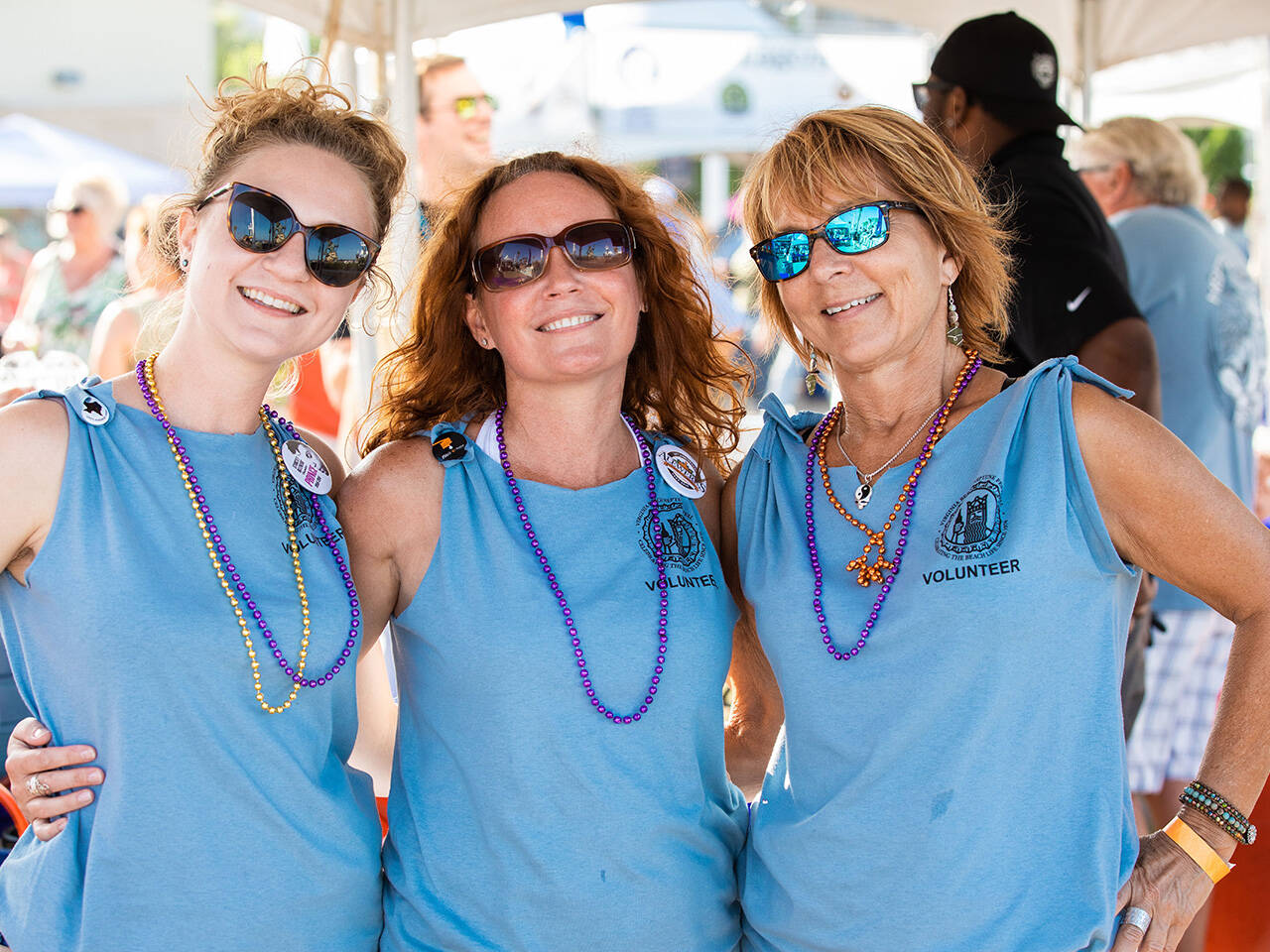 Volunteers posing for photo at Coastal Craft Beer Festival