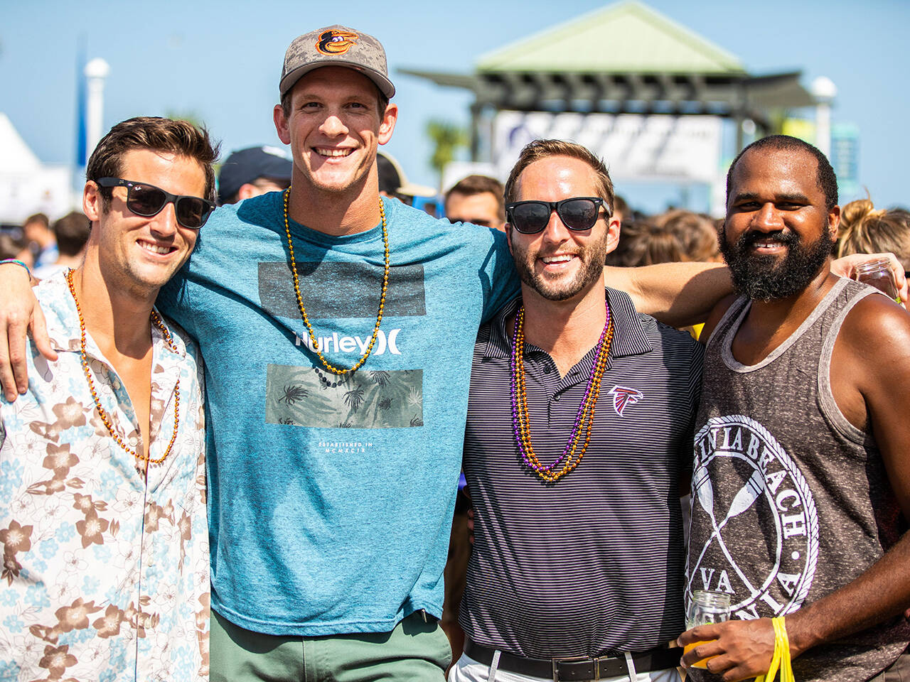 Group posing for photo at Coastal Craft Beer Festival