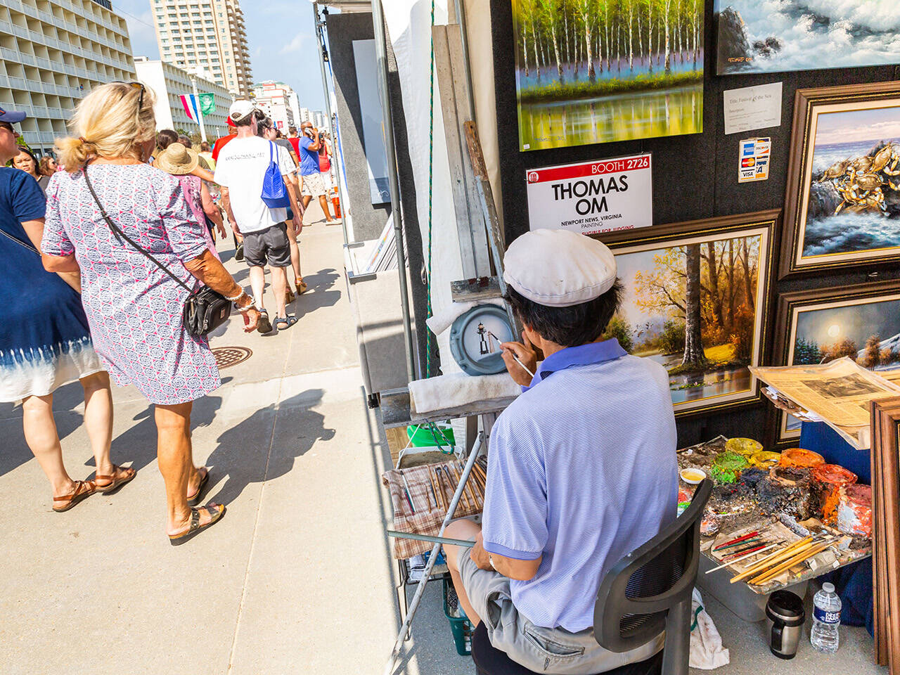 Artist working on Boardwalk during  Neptune Festival Art & Craft Show