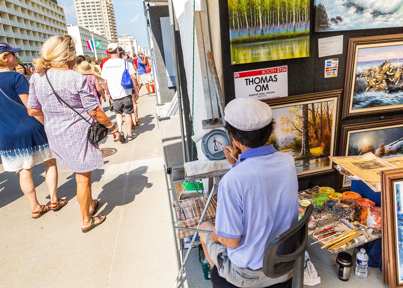 Artist working on Boardwalk during  Neptune Festival Art & Craft Show