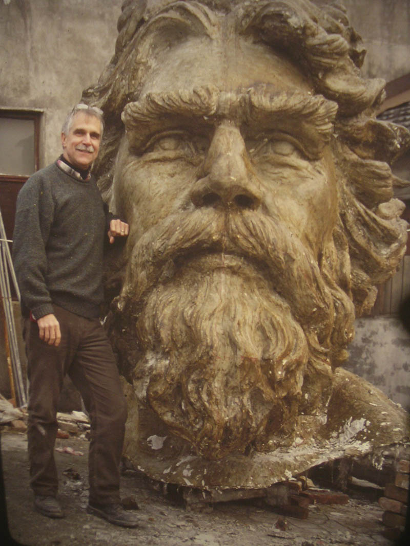 Paul DiPasquale next to Neptune statue head
